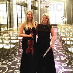 The EG Flute & Violin Duo in a function room
