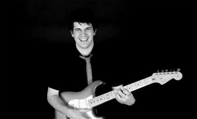 The SR Function/Party Band Smiling guitarist from Party Band who play in Lancashire, Merseyside, Not