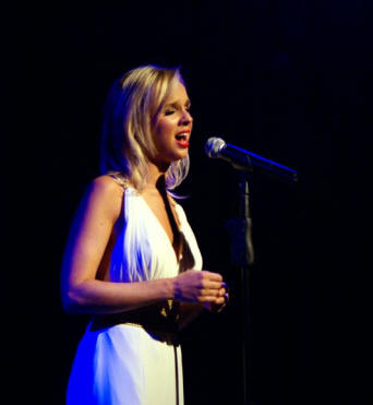 Singer - Gemma Singer with blond hair. She performs in Cambridgeshire, Dorset and Essex.