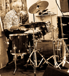 The CM Ceilidh / Barndance Band Drummer from band who play in Norfolk surrounded by equipment