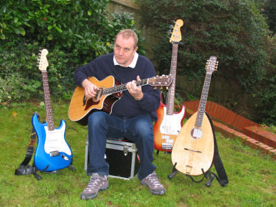 The BB Barn Dance/ Ceilidh Band Guitarist from band who play in Middlesex and Kent checking his inst