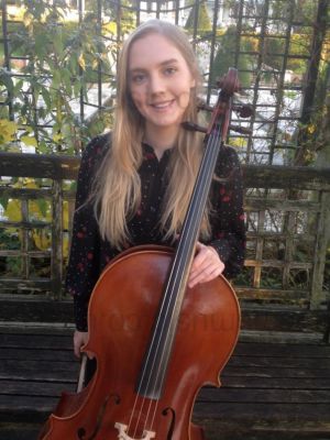 Hannah with cello and trees